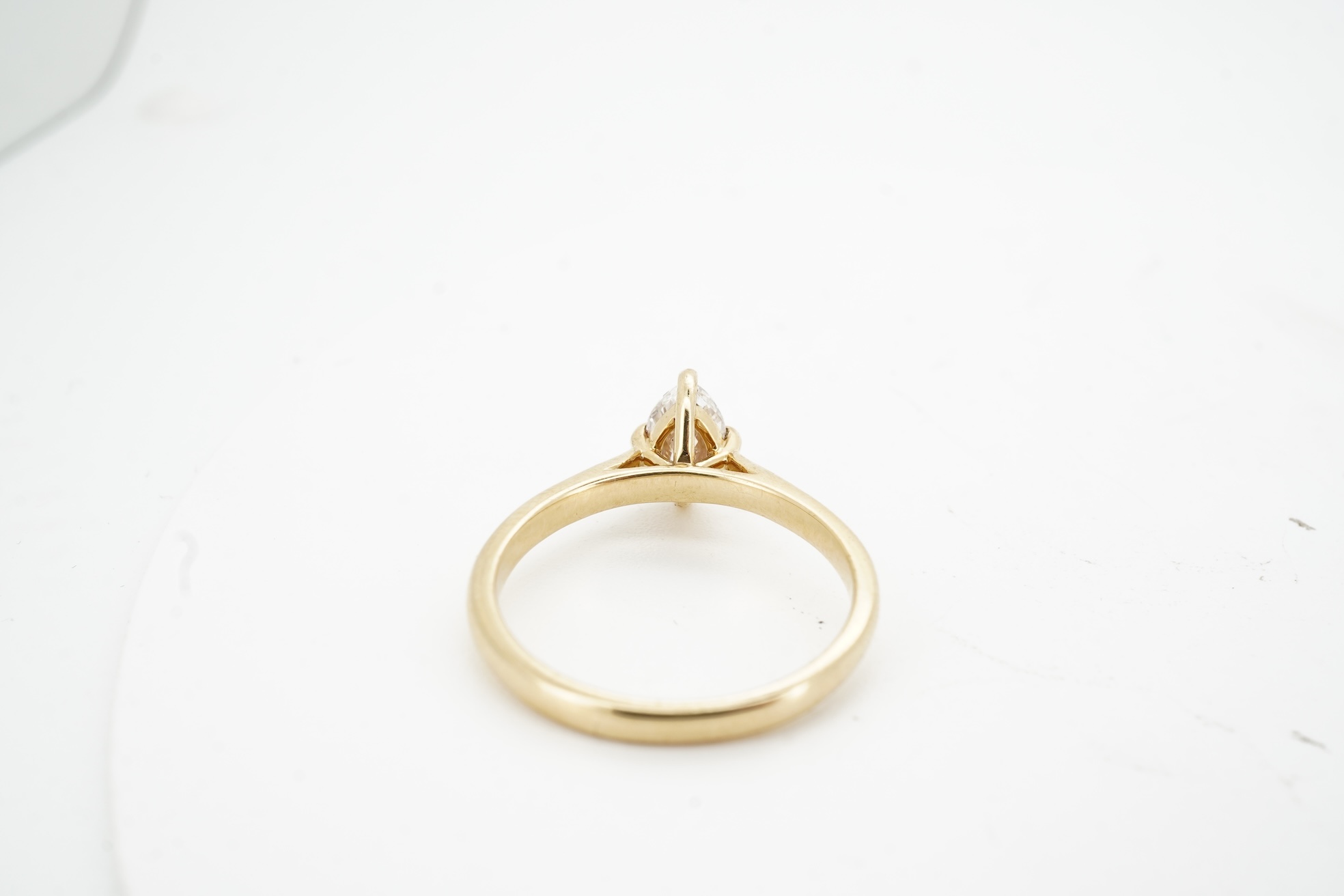 A diamond ring, claw-set with a marquise-shaped diamond weighing approximately 0.70 carats, mounted in gold, size L1/2, gross weight approximately 3 grams